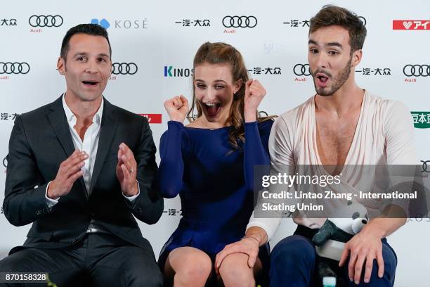 Gabriella Papadakis and Guillaume Cizeron of France reacts after compete in the Ice Dance Free Dance on day two of Audi Cup of China ISU Grand Prix...