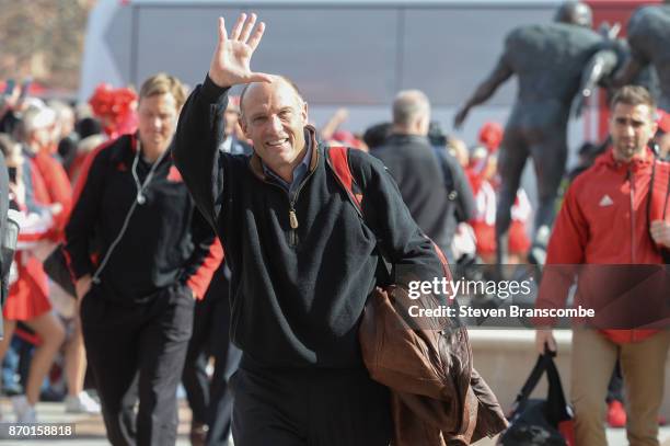 Head coach Mike Riley of the Nebraska Cornhuskers greets fans before the game against the Northwestern Wildcats at Memorial Stadium on November 4,...