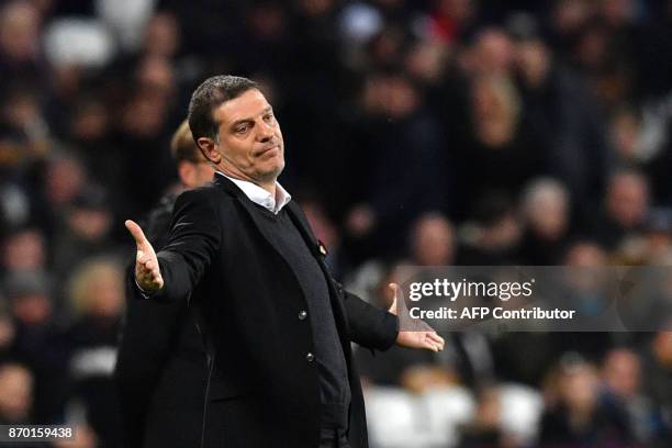 West Ham United's Croatian manager Slaven Bilic gestures during the English Premier League football match between West Ham United and Liverpool at...