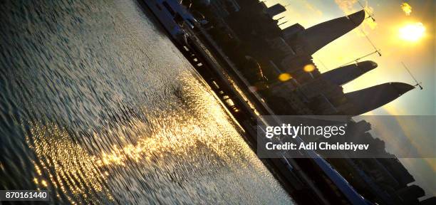 BAKU, AZERBAIJAN : Picture view of the Baku towers. Baku Flame Tower. View of the Baku Flame towers. City view. Baku Azerbaijan. Flame towers. Lovely background. Beautiful view. Sunset background. Flame Towers building is being built