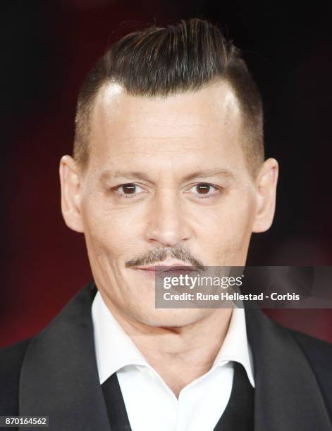 Johnny Depp attends the 'Murder On The Orient Express' World Premiere at Royal Albert Hall on November 02, 2017 in London, England. .