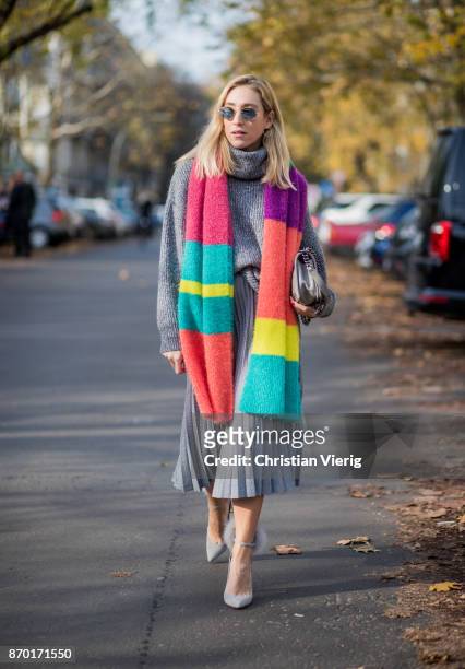 Sonia Lyson wearing grey Jimmy Choo wild leder pumps with furs, grey Zara midi pleated skirt, multi colour scarf Zara, grey turtleneck knit Zara, Ray...