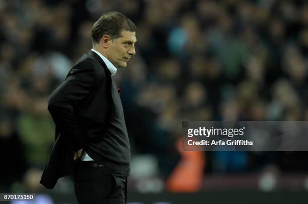 Slaven Bilic of West Ham United watches on during the Premier League match between West Ham United and Liverpool at London Stadium on November 4,...