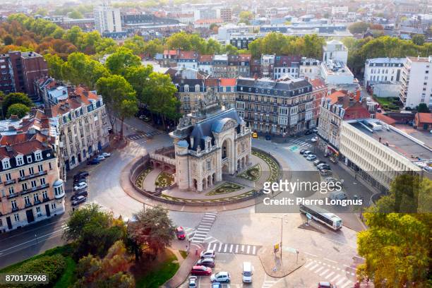 the paris gate monument (porte de paris), view from the belfry of lille city hall in october, lille, north of france - lille foto e immagini stock