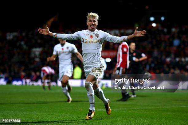 Ezgjan Alioski of Leeds celebrates after scoring the equaliser to make it one all during the Sky Bet Championship match between Brentford and Leeds...