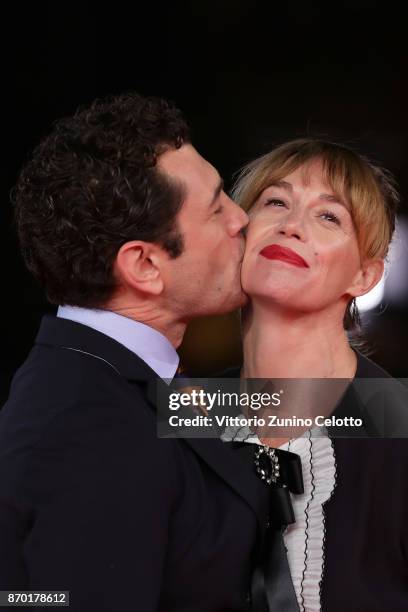 Vinicio Marchioni and Milena Mancini walk a red carpet for 'The Place' during the 12th Rome Film Fest at Auditorium Parco Della Musica on November 4,...