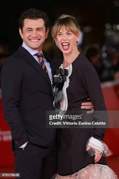 Vinicio Marchioni and Milena Mancini walk a red carpet for 'The Place' during the 12th Rome Film Fest at Auditorium Parco Della Musica on November 4,...