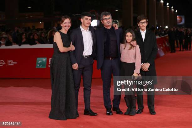 Federica Rizzo , Paolo Genovese and their sons walk a red carpet for 'The Place' during the 12th Rome Film Fest at Auditorium Parco Della Musica on...