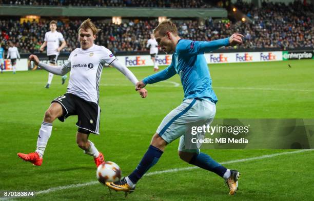 Europa League, round 4: Rosenborg BK 1-1 Zenit St Petersburg . Rosenborg's Morten Konradsen and Zenit St Petersburg's Aleksandr Kokorin .
