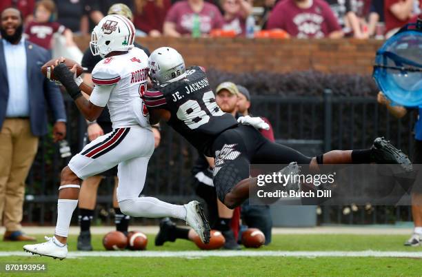Isaiah Rodgers of the Massachusetts Minutemen intercepts a pass intended for Jesse Jackson of the Mississippi State Bulldogs during the second half...