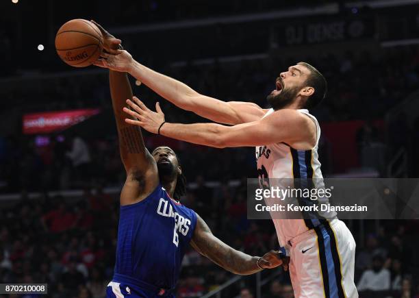 DeAndre Jordan of the Los Angeles Clippers steals the ball from Marc Gasol of the Memphis Grizzlies during the first half of the basketball game at...