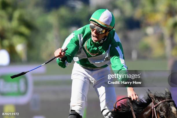 Irad Ortiz Jr. Celebrates after riding Bar Of Gold to a win in the Breeders' Cup Filly & Mare Sprint on day two of the 2017 Breeders' Cup World...