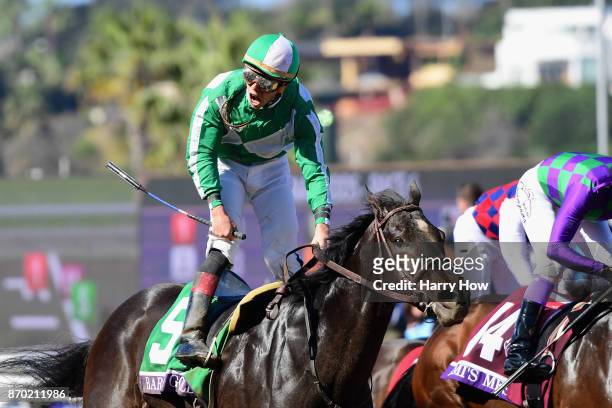 Irad Ortiz Jr. Celebrates after riding Bar Of Gold to a win in the Breeders' Cup Filly & Mare Sprint on day two of the 2017 Breeders' Cup World...