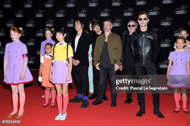 Indochine attends the 19th NRJ Music Awards on November 4, 2017 in Cannes, France.