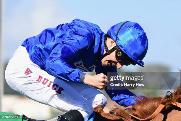 William Buck celebrates after riding Wuheida to a win in the Breeders' Cup Filly & Mare Turf race on day two of the 2017 Breeders' Cup World...