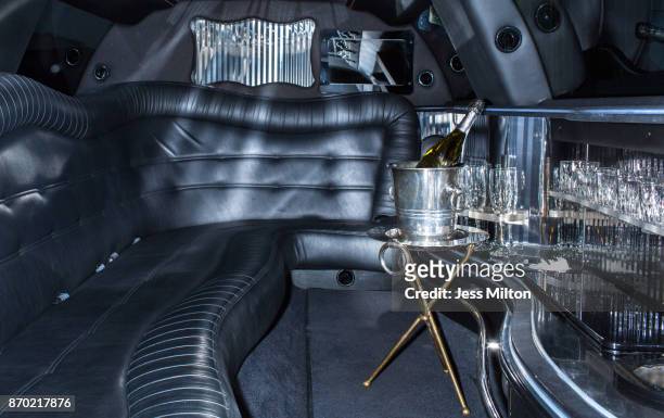 interior of a limousine with drinks - limo stockfoto's en -beelden