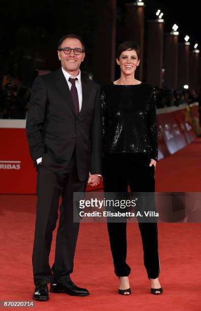 Valerio Mastandrea and Chiara Martegiani walk a red carpet for 'The Place' during the 12th Rome Film Fest at Auditorium Parco Della Musica on...