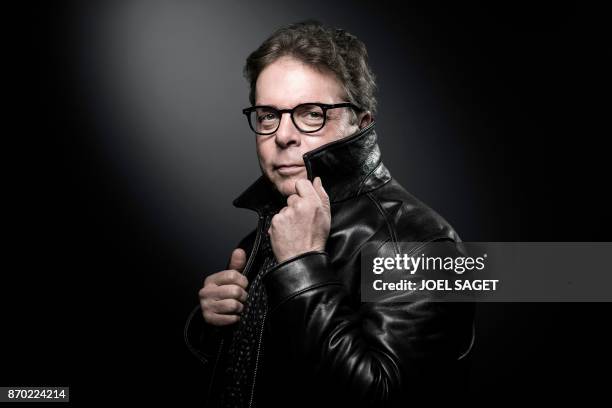 Novelist Douglas Kennedy poses during a photo session in Paris on November 2, 2017.