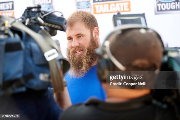 Travis Frederick speaks in an interview during the Built Ford Tough Toughest Tailgate stop for Dallas Cowboys fans on November 4, 2017 in Grapevine,...