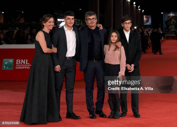 Federica Rizzo , Paolo Genovese and their sons walk a red carpet for 'The Place' during the 12th Rome Film Fest at Auditorium Parco Della Musica on...