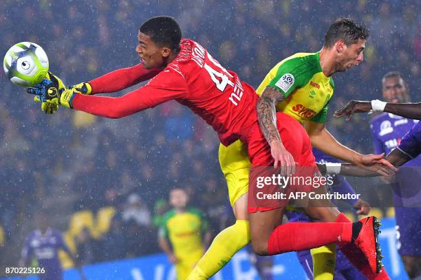 Nantes' Argentinian forward Emiliano Sala vies with Toulouse's French goalkeeper Alban Lafont during the French L1 football match Nantes versus...