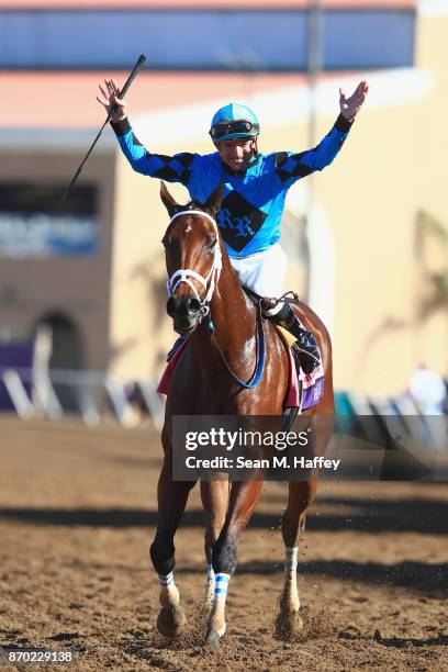 Kent Desormeaux celebrates after riding Roy H to a win in the Twinspires Breeders' Cup Sprint on day two of the 2017 Breeders' Cup World Championship...