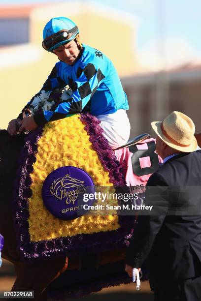 Trainer Peter Miller celebrates after Roy H ridden by Kent Desormeaux wins the Twinspires Breeders' Cup Sprint on day two of the 2017 Breeders' Cup...