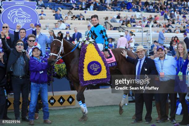 Kent Desormeaux celebrates after riding Roy H to a win in the Twinspires Breeders' Cup Sprint on day two of the 2017 Breeders' Cup World Championship...