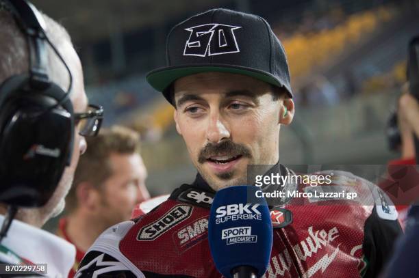 Eugene Laverty of Ireland and Milwaukee Aprilia speaks wth journalists on the grid during the Superbike race 2 during the FIM Superbike World...