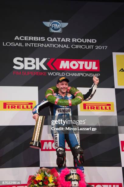 Lucas Mahias of France and GRT Yamaha Official WorldSSP Team celebrates on the podium the victory of World Supersport championship during the FIM...