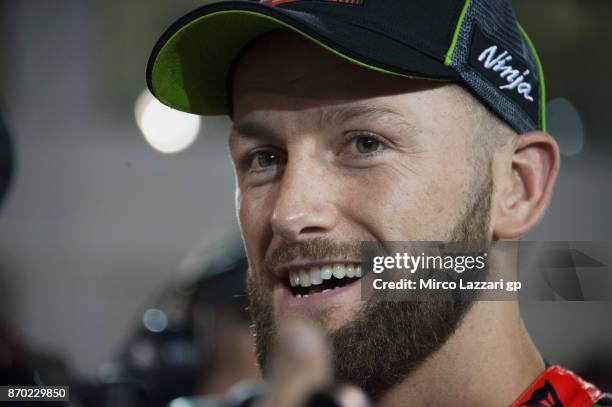 Tom Sykes of Great Britain and Kawasaki Racing Team speaks wth journalists on the grid during the Superbike race 2 during the FIM Superbike World...