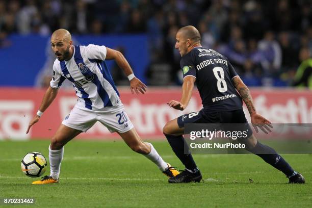 Porto's Portuguese midfielder Andre Andre with Belenenses´s Portuguese midfielder Andre Sousa during the Premier League 2017/18 match between FC...