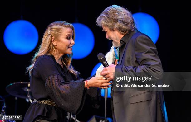 Anastacia hands over the Legend of Sport Award to Reinhold Messner during the German Sports Media Ball at Alte Oper on November 4, 2017 in Frankfurt...