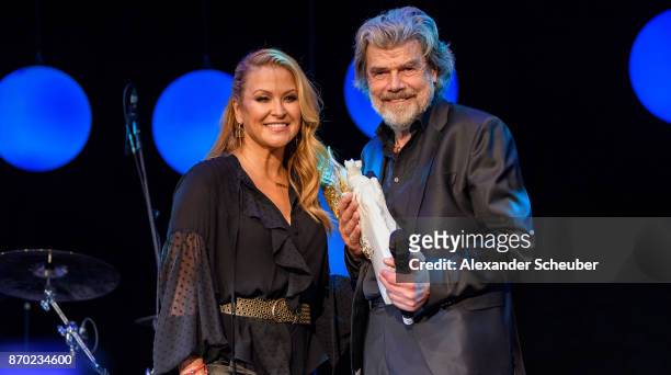 Anastacia hands over the Legend of Sport Award to Reinhold Messner during the German Sports Media Ball at Alte Oper on November 4, 2017 in Frankfurt...