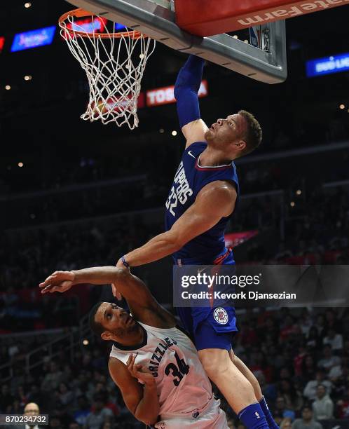 Blake Griffin of the LA Clippers elevates for a dunk over Brandan Wright of the Memphis Grizzlies during the second half of the basketball game at...