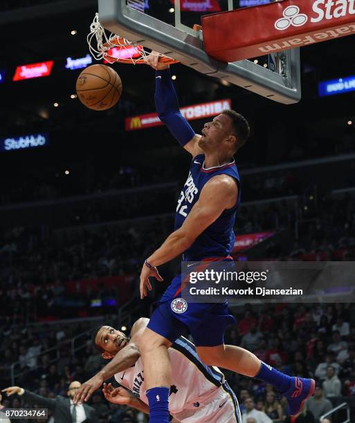 Blake Griffin of the LA Clippers elevates for a dunk over Brandan Wright of the Memphis Grizzlies during the second half of the basketball game at...