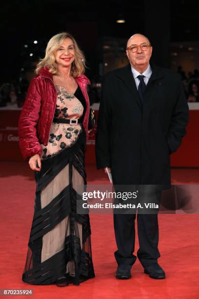 Francesca Lo Schiavo and Dante Ferretti walk a red carpet for 'The Place' during the 12th Rome Film Fest at Auditorium Parco Della Musica on November...