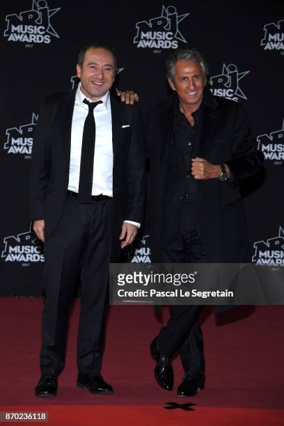 Patrick Timsit and Richard Anconina attend the 19th NRJ Music Awards on November 4, 2017 in Cannes, France.
