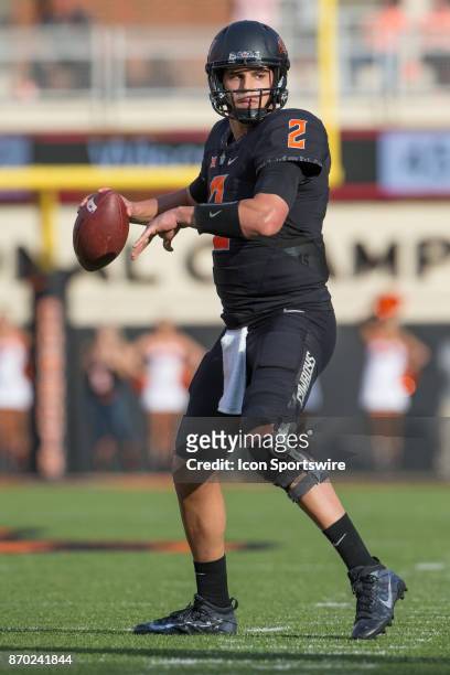 Oklahoma State Cowboys quarterback Mason Rudolph during the Big 12 conference college Bedlam rivalry football game between the Oklahoma Sooners and...