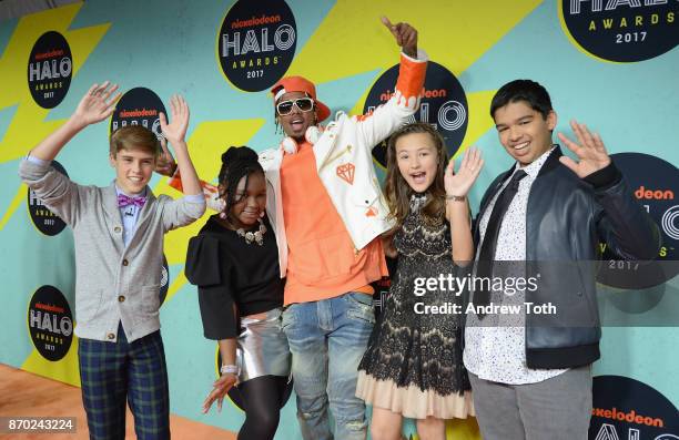 Nick Cannon poses with HALO Honorees Caleb White, Zoe Terry, Raegan Junge and Andrew Dunn attend the 2017 Nickelodeon HALO Awards at Pier 36 on...