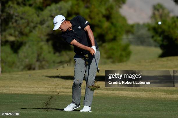 John Huh hits his approach shot on the first hole during the third round of the Shriners Hospitals For Children Open at the TPC Summerlin on November...