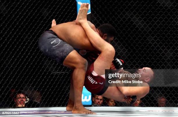 Curtis Blaydes slams Aleksei Oleinik of Russia in their heavyweight bout during the UFC 217 event at Madison Square Garden on November 4, 2017 in New...