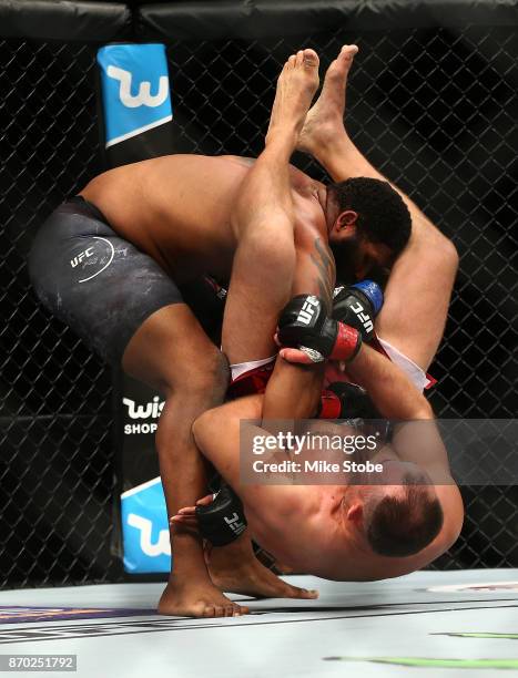 Curtis Blaydes slams Aleksei Oleinik of Russia in their heavyweight bout during the UFC 217 event at Madison Square Garden on November 4, 2017 in New...