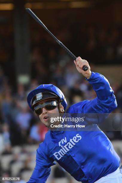 Jockey Mickael Barzalona celebrates after riding Talismanic to a win in the Longines Breeders' Cup Turf on day two of the 2017 Breeders' Cup World...