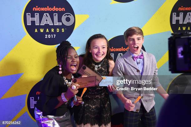 Zoe Terry, Raegan Junge and Caleb White pose backstage at the 2017 Nickelodeon HALO Awards at Pier 36 on November 4, 2017 in New York City.