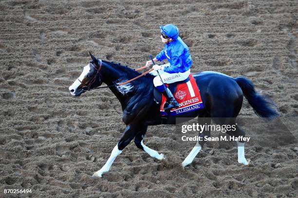 Jockey Mickael Barzalona celebrates after riding Talismanic to a win in the Longines Breeders' Cup Turf on day two of the 2017 Breeders' Cup World...