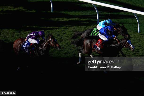 Talismanic ridden by Mickael Barzalona defeats Beach Patrol ridden by Joel Rosario and Highland Reel ridden by Ryan Moore to win the Longines...