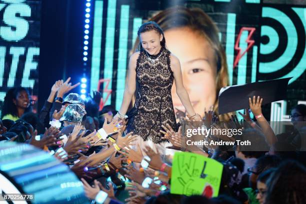 Raegan Junge arrives on stage at the 2017 Nickelodeon HALO Awards at Pier 36 on November 4, 2017 in New York City.