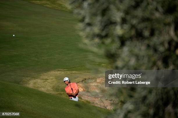 Aaron Baddeley of Australia hits his approach shot on the 15th hole during the third round of the Shriners Hospitals For Children Open at the TPC...