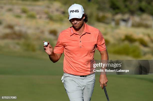 Aaron Baddeley of Australia waves to the crowd on the 15th green during the third round of the Shriners Hospitals For Children Open at the TPC...